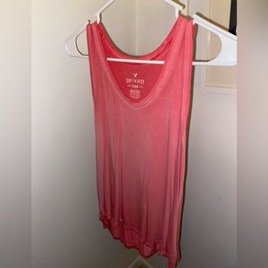 salmon colored “soft & sexy” tank
loose fitting and breathable